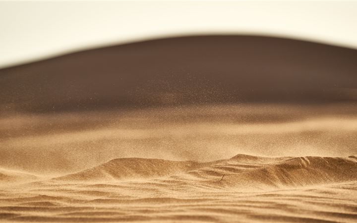 brown sand in closeup photography MacBook Air wallpaper