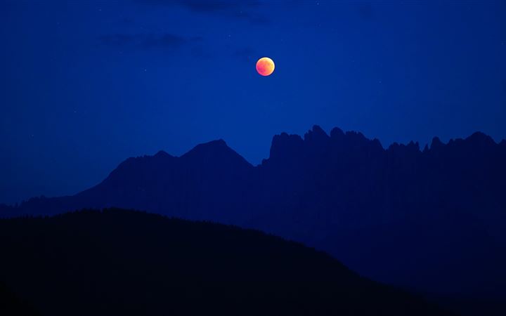 lunar eclipse with silhouette mountain All Mac wallpaper