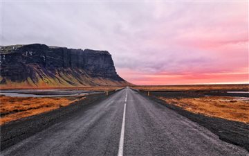 asphalt road and cliff horizon MacBook Pro wallpaper