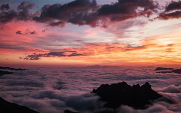 aerial photography of sea of clouds during golden MacBook Air wallpaper