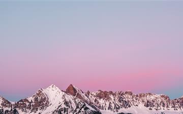 Lovely sunset behind a snowy mountain in Flums Swi All Mac wallpaper