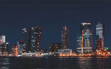city skyline during night time All Mac wallpaper