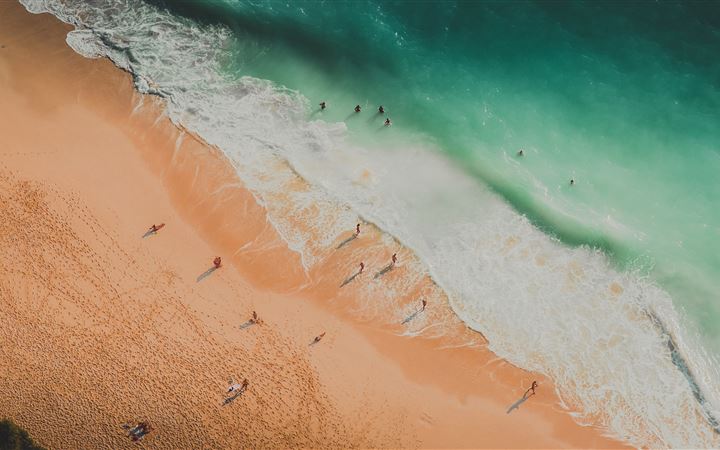 aerial photography of people at the beach iMac wallpaper