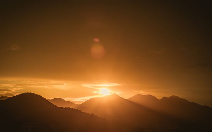 mountain range during golden hour iMac wallpaper