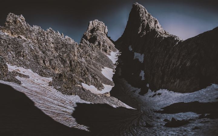 dark mountains covered by snow 5k All Mac wallpaper