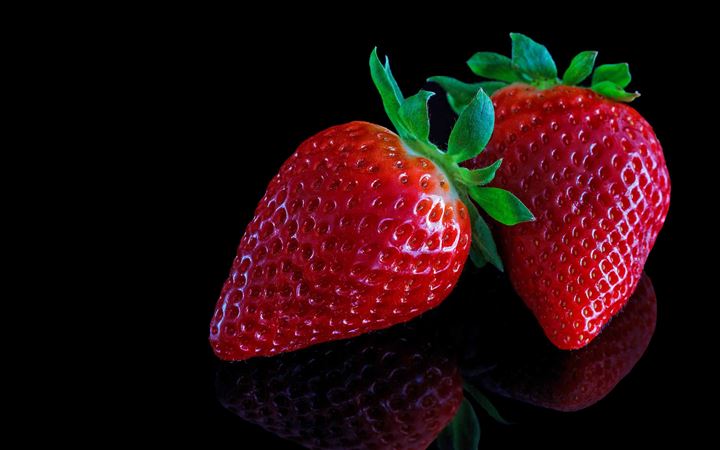 Strawberries On Black MacBook Air wallpaper