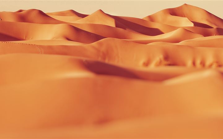 landscape photo of sand MacBook Air wallpaper