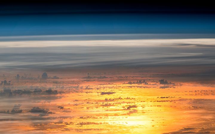 sunset from the international space station MacBook Air wallpaper