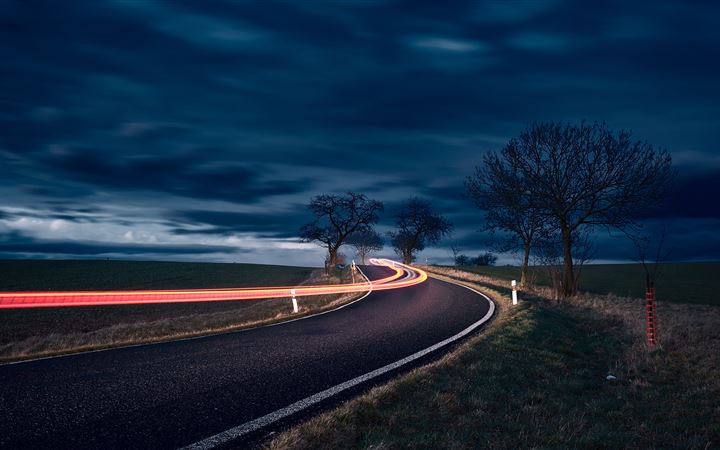 timelapse photography of road and bare trees All Mac wallpaper