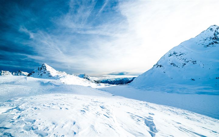Frozen mountainous landsc... MacBook Pro wallpaper
