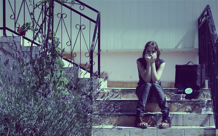 Girl Sitting On The Stair MacBook Pro wallpaper