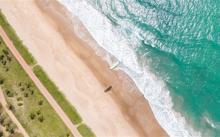 aerial view of seashore at daytime MacBook Pro wallpaper