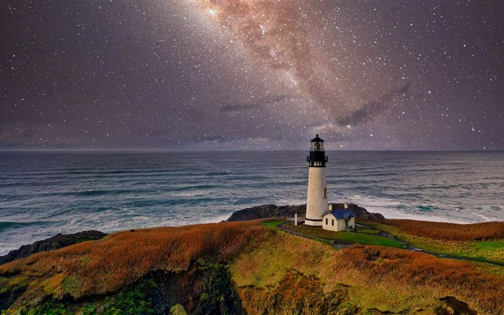 lighthouse under starry night MacBook Pro wallpaper