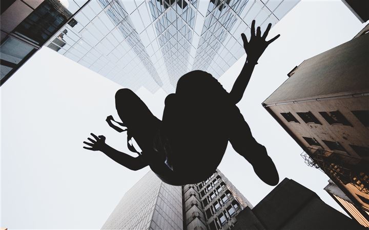 silhouette of person jump... MacBook Pro wallpaper