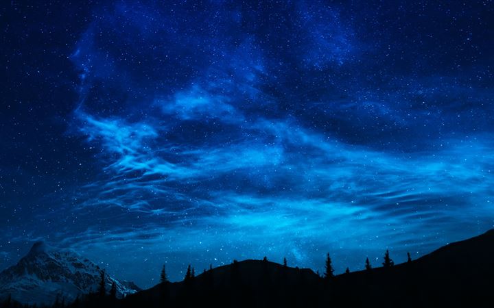 summer night sky full of stars over mountain lands MacBook Pro wallpaper