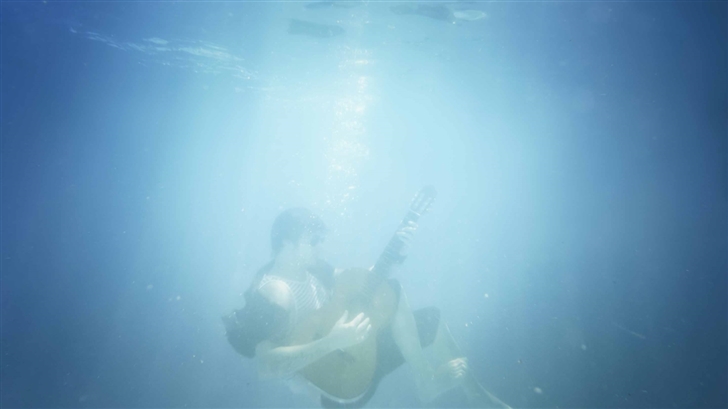 Playing Guitar Underwater Mac Wallpaper