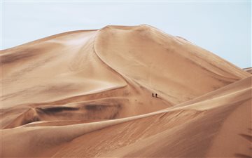 Hiking Through Sand Dunes MacBook Air wallpaper