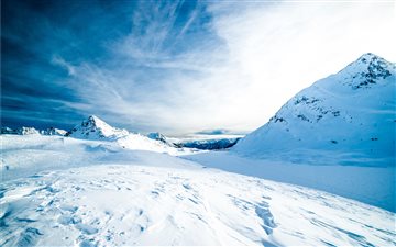 Frozen mountainous landsc... MacBook Pro wallpaper
