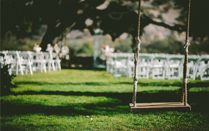 Wooden swing at wedding v... Mac Wallpaper