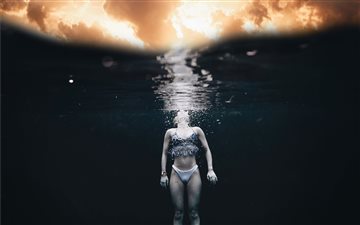 woman in bikini set swimm... All Mac wallpaper