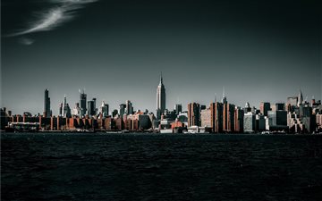panoramic photo of city during daytime iMac wallpaper