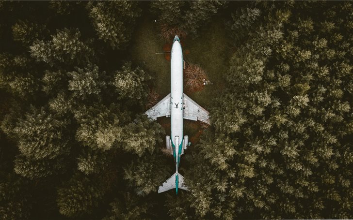 aerial photography of an airplane surrounded with  Mac Wallpaper