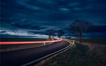 timelapse photography of road and bare trees All Mac wallpaper