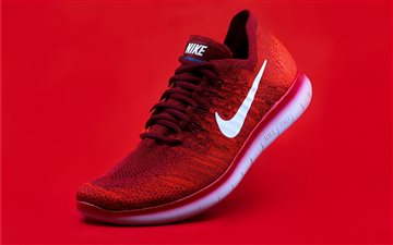 unpaired red Nike sneaker MacBook Air wallpaper
