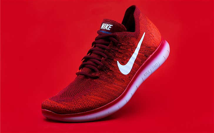 unpaired red Nike sneaker Mac Wallpaper