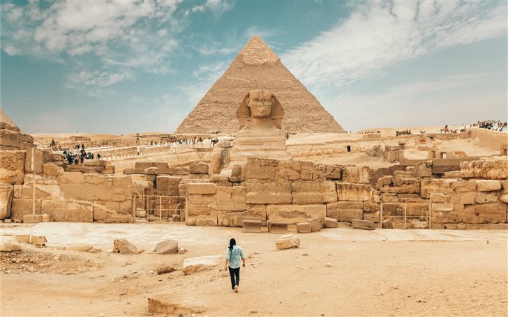 person walking near The Great Sphinx Mac Wallpaper