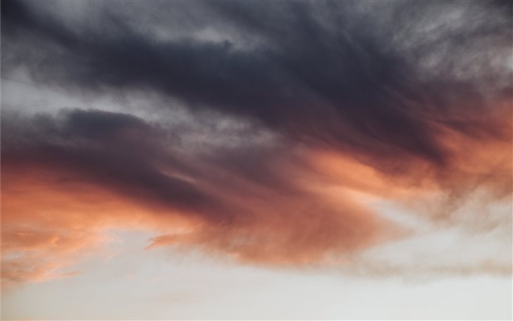 grey and orange clouds Mac Wallpaper