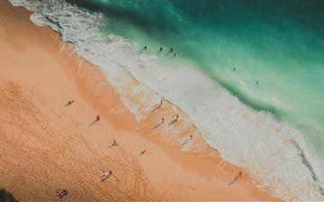 aerial photography of people at the beach iMac wallpaper