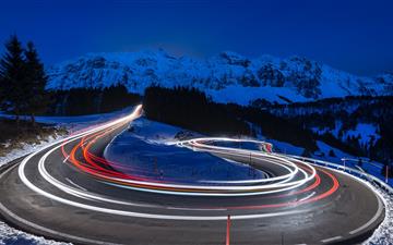 time lapse photography of curve road iMac wallpaper