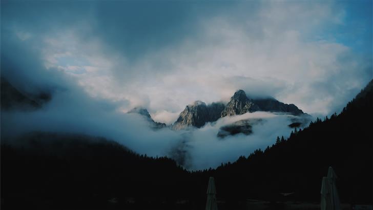 silhouette of foggy mountain scenery Mac Wallpaper