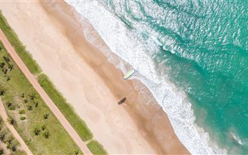 aerial view of seashore at daytime MacBook Pro wallpaper