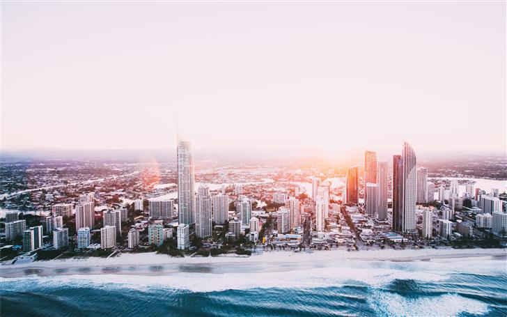 city skyline near body of water during daytime Mac Wallpaper