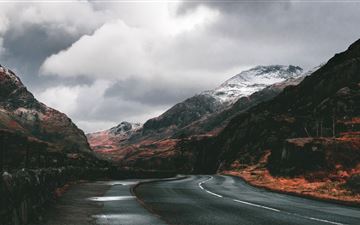 beautiful road between mountains 5k iMac wallpaper