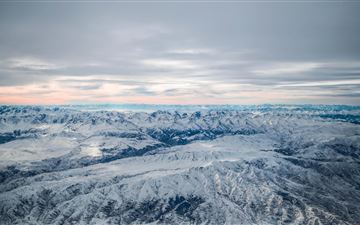 ice covered mountains aerial photography 5k MacBook Pro wallpaper