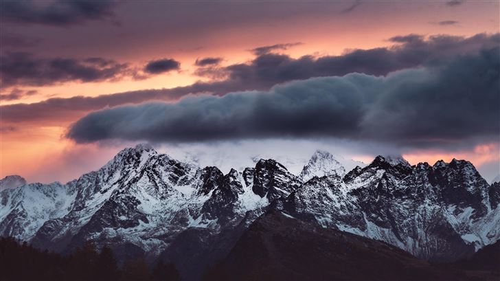 snow covered mountains clouds over it 5k Mac Wallpaper