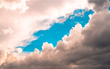 blue clouds 5k MacBook Air wallpaper