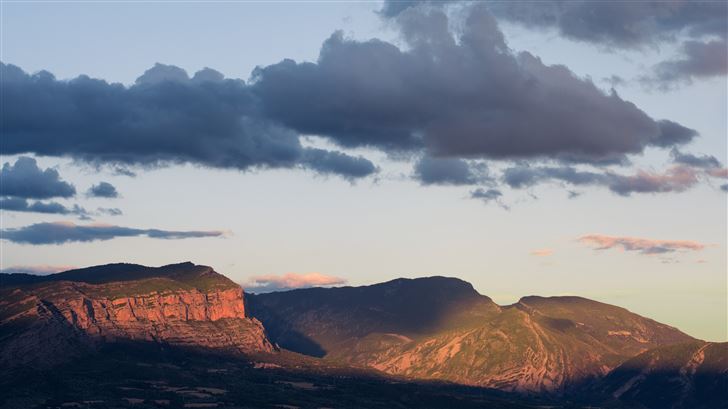 rocks mountains clouds daylight 5k Mac Wallpaper