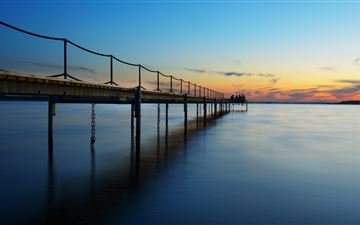coast sea sunset pier 5k MacBook Pro wallpaper