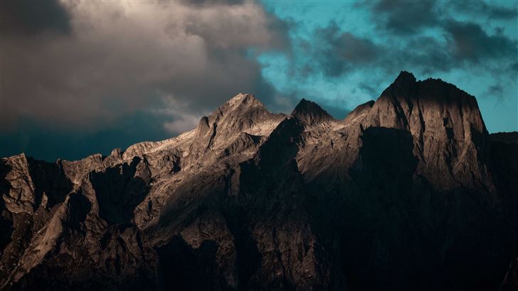 a rocky mountain with clouds 5k Mac Wallpaper