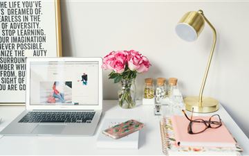 MacBook Air beside gold colored study lamp and spi MacBook Pro  wallpaper