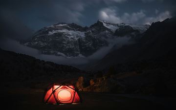 A red tent sitting in the middle of a field MacBook Pro  wallpaper