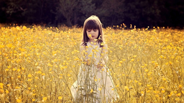 Cute Child In A Flower Field Mac Wallpaper