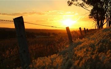 Sunset Through Barbed Wire Warwick All Mac wallpaper
